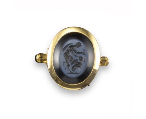 An 18th century nicolo intaglio ring, depicting Oedipus and the Sphinx, in later yellow gold mount, size R