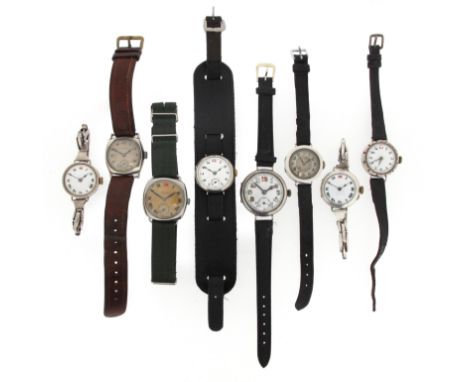 Eight silver wristwatches by Longines, manual movements, on silver, leather or fabric bands