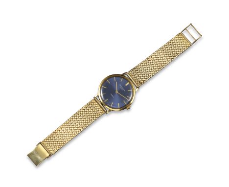A gentleman's Patek Philippe gold Calatrava wristwatch, the signed blue dial with baton numerals, manual movement, movement n