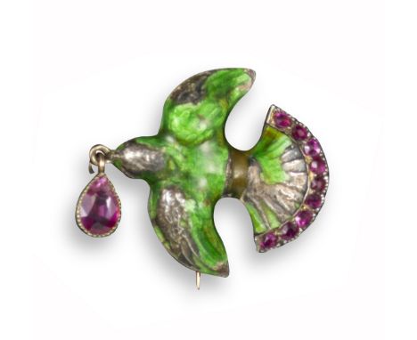 An enamel and ruby dove brooch by Child &amp; Child, decorated with green enamel (damaged) and rubies set to the tail in silv