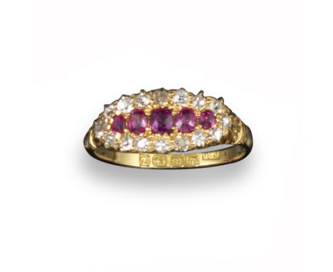 A ruby and diamond cluster ring, the navette-shaped ring set with a line of graduated cushion-shaped rubies within a border o