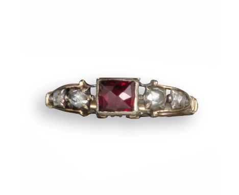 A George III garnet and diamond ring, the rose-cut garnet set with graduated rose-cut diamond shoulders in silver and gold cl