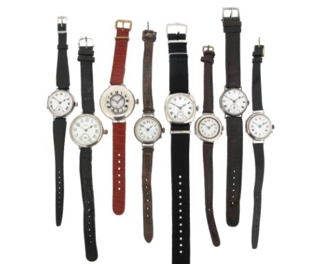 Eight silver wristwatches by Longines, manual movements, on leather and fabric bands