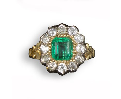 A Regency emerald and diamond cluster ring, c1830, the emerald-cut emerald is set within a surround of old circular-cut diamo