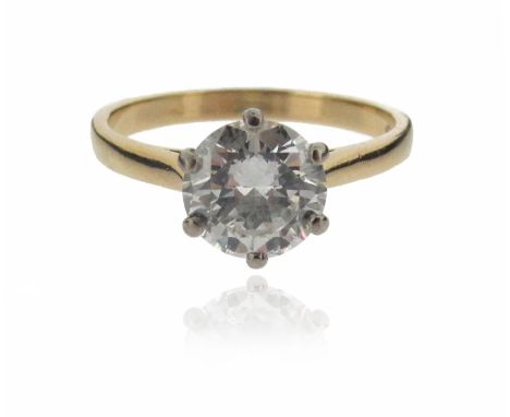 A diamond solitaire ring, the round brilliant cut diamond weighs 1.48cts and set in 18ct yellow gold, hallmarks for 2001, siz