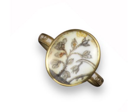 A George III mourning ring, the oval glazed locket displays a plant (possibly rose) with a drooping bud painted in sepia, pro