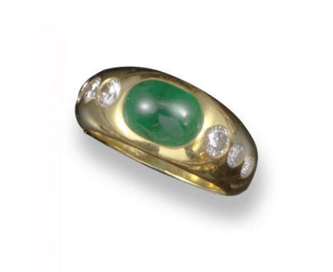 An emerald and diamond gypsy ring, set with an emerald cabochon and three graduated round brilliant-cut diamonds to each shou