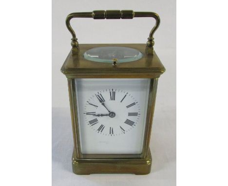 Brass repeating carriage clock retailed by Goldsmiths, London H 13 cm (excluding handle)