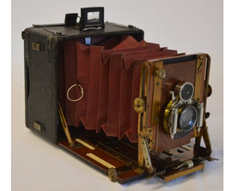 Sanderson hand/plate camera fitted with a C.P. Goerz Berlin lens No 235815, with case and quantity of plates