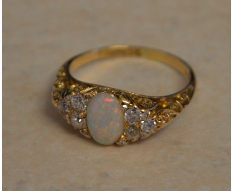 18ct gold opal and diamond cluster ring, opal approx 0.6ct and approx 0.5ct of diamonds, total weight approx 4.7g Ring Size P