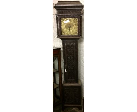 19th century longcase clock in a carved case with brass dial (no weight & pendulum & glass missing)