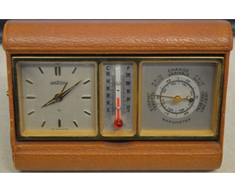 A rare Angelus 3 section travelling clock / desk clock featuring alarm clock, thermometer and barometer encased in tan colour