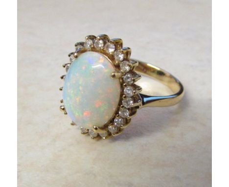 14ct gold opal and diamond ring size N total weight 5.4 g