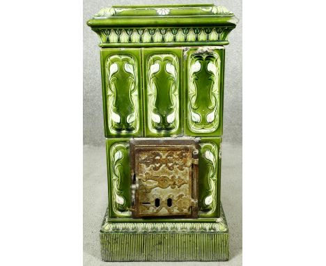 An late 19th century indoor stove with Art Nouveau ceramic tiling. H.64 W.36 D.53cm 