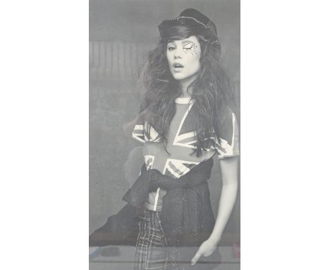 A large framed and glazed photographic print from the series of Chanel's Little Black Jacket book by Karl Largerfield and Car