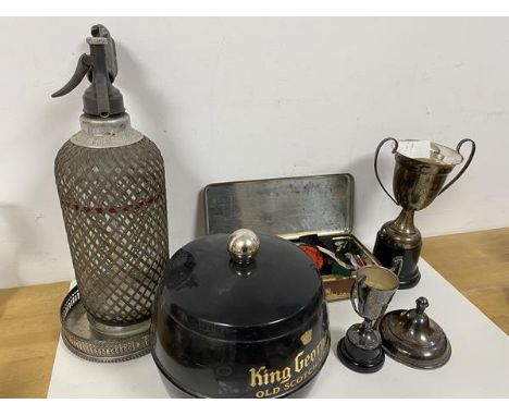 A mixed lot including two Epns trophies, an Epns wine coaster, a 1910-35 Jubilee souvenir tin, a quantity of patches such as 