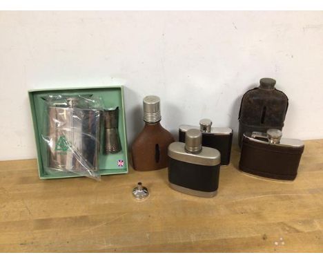 A collection of hip flasks including Edwardian flask, cup inscribed Grant's Special Whisky measures 16cm high (6)