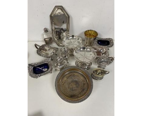 A quantity of silver plate including a wine coaster (5cm x 15cm), salts, condiment pot, flask, salt and peppers (a lot)