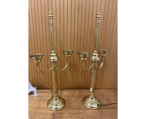 A pair of candelabra style brass table lamps each with two lamp holders on column style body measure 56cm high