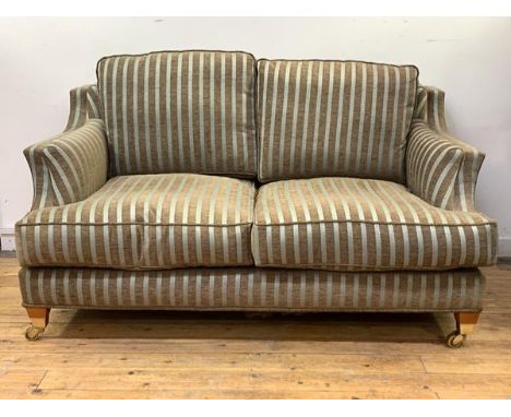 Wade Upholstery, A contemporary 'Kempston' two seat sofa, upholstered in a teal and brown stripped chenille fabric, raised on