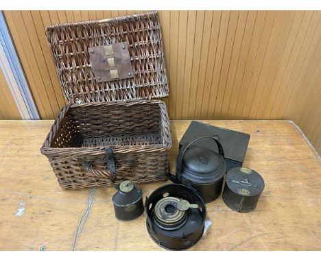 A travelling tea set including a kettle, burner which is inscribed Sirram, a tea and sugar canister and a cream jug along wit