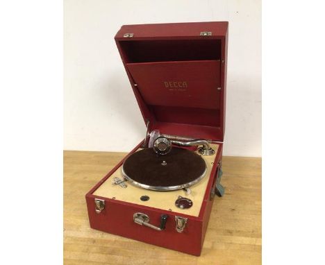 A Decca travel record player in red travelling case measures 17 x 29 x 42
