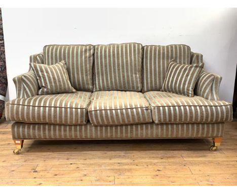 Wade Upholstery, A contemporary 'Kempston' three seat sofa, upholstered in a teal and brown stripped chenille fabric, raised 