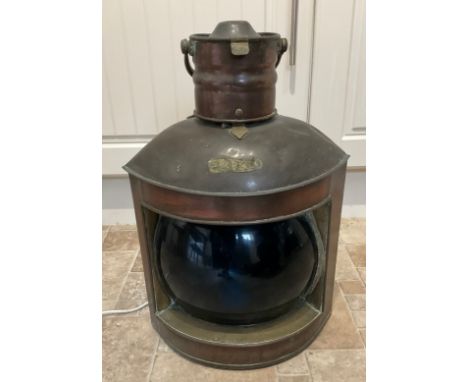 A copper and brass starboard lamp, electrified. 50cm h. 