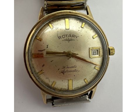 A gentleman's 9 carat gold cased Rotary wristwatch with date aperture on gold plated expanding bracelet. Case: 35mm. 