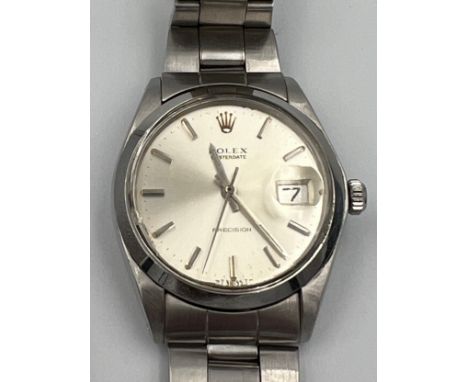 A boxed gentleman's Rolex Oysterdate Precision wristwatch, steel case on steel Rolex bracelet. 35mm case. Ref: 6694. Serial N
