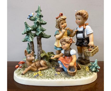 An Original M.J. Hummel Limited Edition group 0284 of 1000  "Psst. leise / Follow that Fawn". 25cm h. Impressed model no. 232