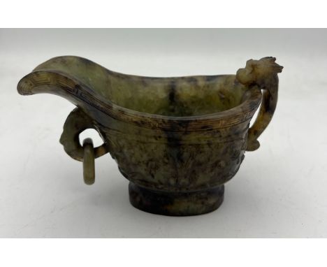 A Chinese Qing spinach green and russet jade Archaistic pouring vessel Yi. 9cm h. 