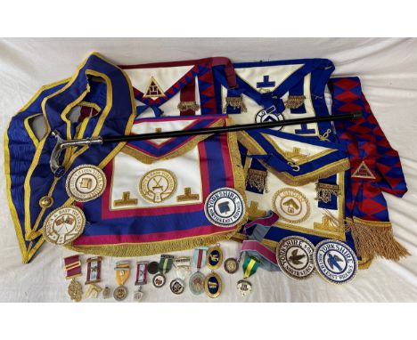 Quantity of masonic regalia to include medals, medallions, aprons, badges, sachets and walking stick. London,  North &amp; Ea