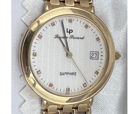 A 14 carat Lucien Piccard watch on 14 carat gold bracelet. Case: 33mm. Back of case stamped 14K 0.585 and watch buckle stampe