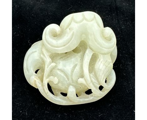 A small jade group depicting catfish, probably Qing dynasty. 5 x 5.5cm. 