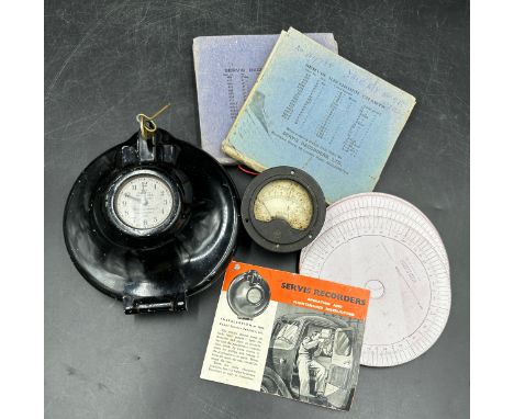The Servis Recorder a time record clock No. 419735 along with a volt reader and two packets of Servis recorder charts. 