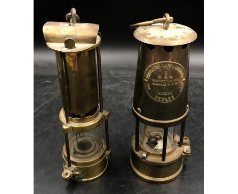 Two Safety Lamps one an Eccles Type 6 M &amp; Q Miners Safety Lamp the other a Gateshead maker but indecipherable. 