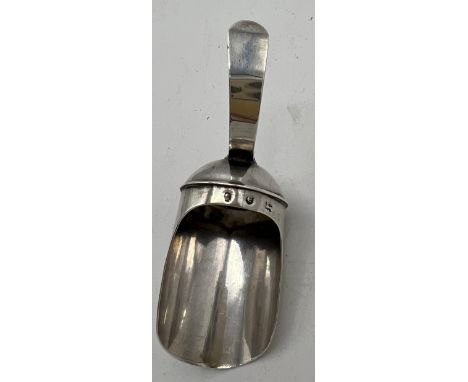 A silver caddy spoon Birmingham 1802, maker Thomas Willmore. 7cm l. 
