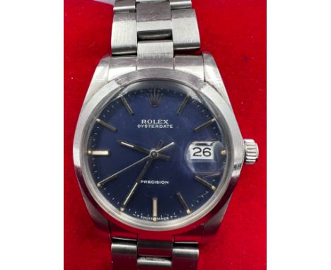 A Rolex Oysterdate Precision stainless steel wristwatch with blue face, on Rolex stainless steel bracelet. Serial No. 8959083
