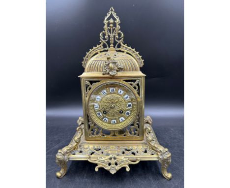 An ornate brass mantle clock 39cm h.