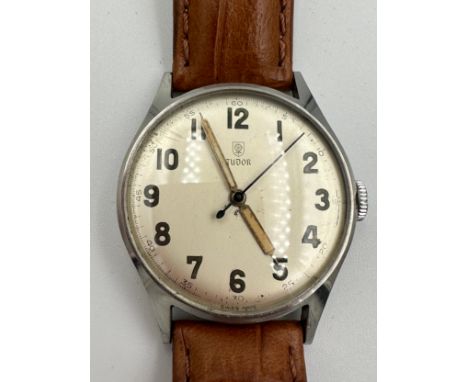 A 1950's Tudor gentleman's wristwatch, case 34mm with grey military style dial on stainless steel case with glow in the dark 