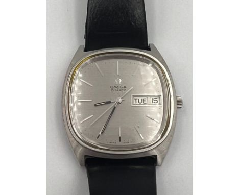Omega, a gentleman's stainless steel quartz wrist watch with black leather strap in case.Good condition light scratches to ba