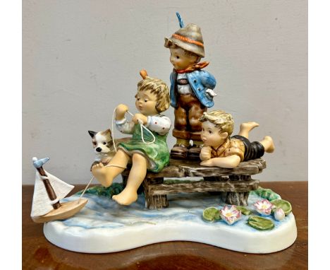 An original M.J. Hummel 2009 Moments in Time Collection, Sailing Lesson. This piece is the 5th in the Moments in Time series.