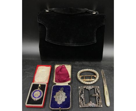 Silver 1927 Medal awarded to Lilian Spendlow for pianoforte playing and another unidentified silver medal presented by Joseph