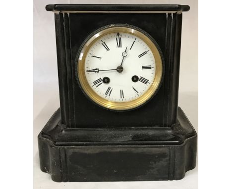 A late 19th century polished slate mantel clock, with an 8 day movement striking on a bell, stamped 'Japy Frères &amp; Cie,' 