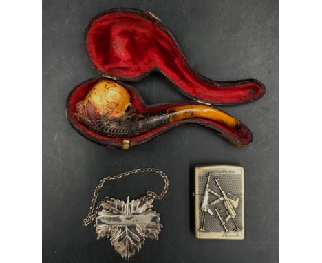 A miscellaneous lot to include a meerschaum pipe, silver hallmarked port label 12gms  and a medal of honor airborne MP40 Subm