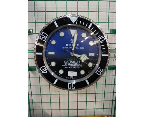 A Rolex deep sea display clock 