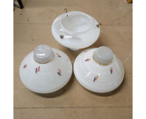 Three glass light shades 
