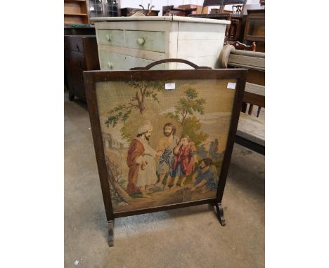 A mahogany tapestry firescreen 