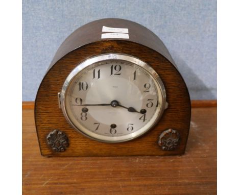 An oak cased Enfield mantel clock with chiming movement 
